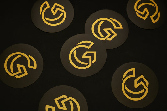 Black stickers with gold 'G' Gallery logo