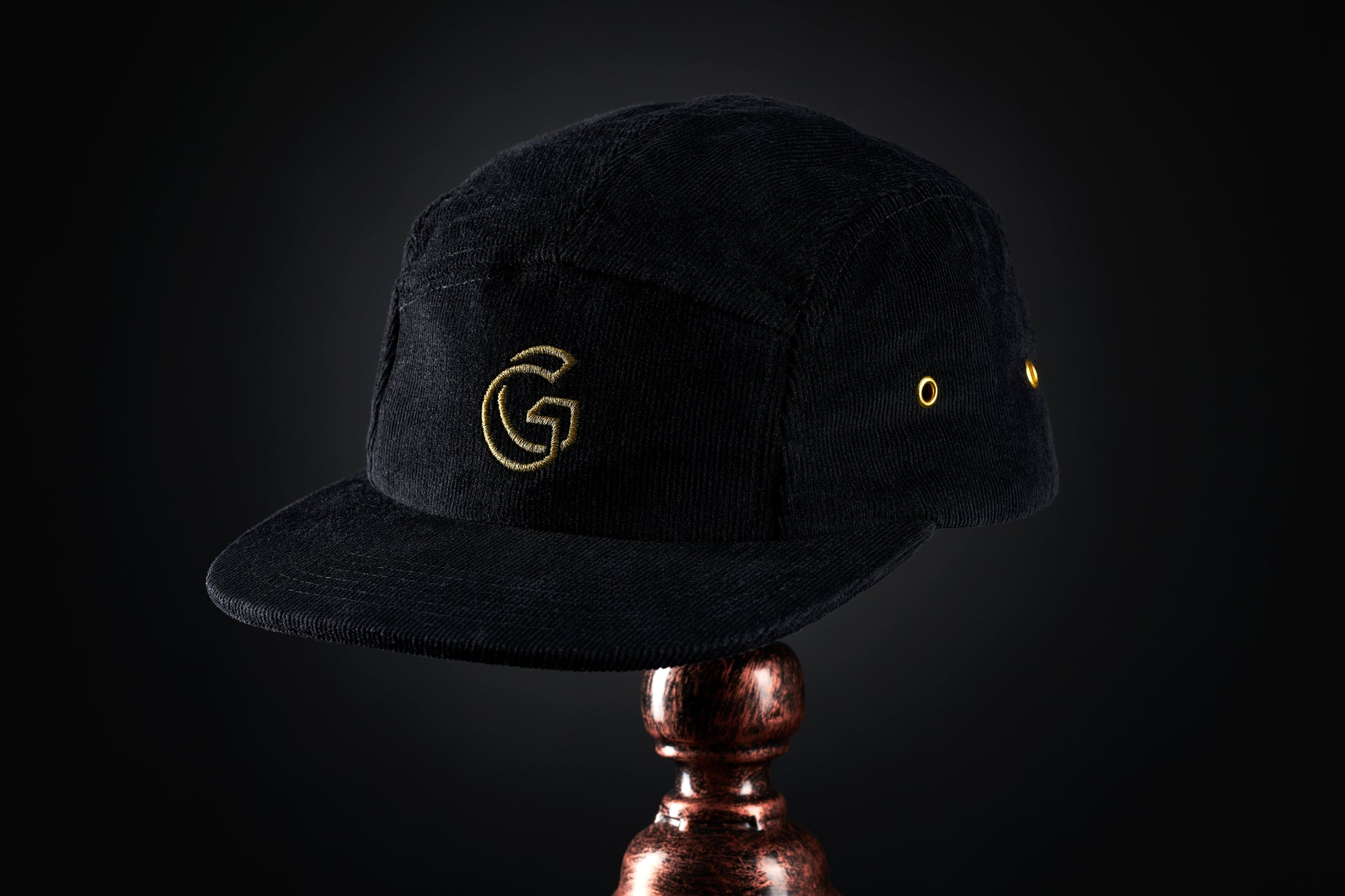 the Regalia cap, black corduroy with gold 'G' Gallery logo